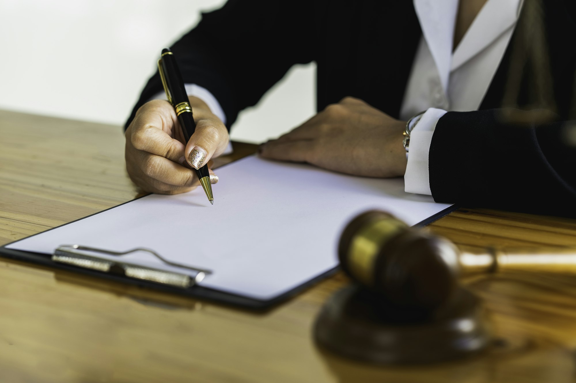 Lawyer business women working and notary signs the documents at office. consultant lawyer, justice a